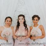 Silk Flowerwall with sheer drapes are the perfect backdrop for photos