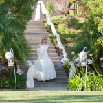 Sometimes the railing just looks a little plain.  We added some sheer draping for this bride's entrance.